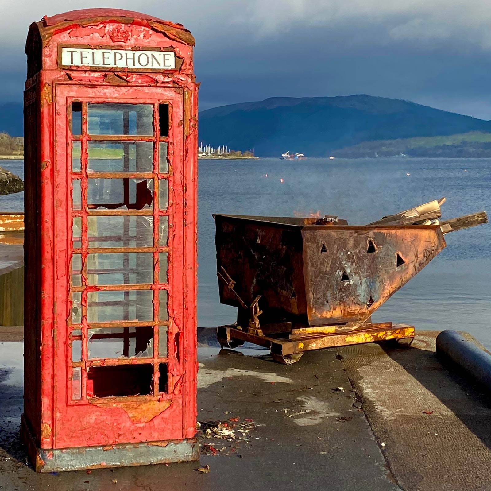 Red telephone kiosk before restoration at Port Bannatyne
